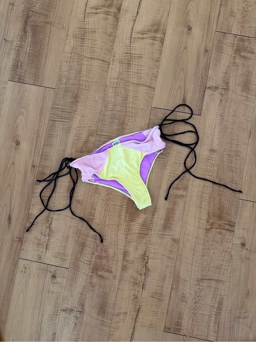Made from recycled plastic bottles crisscrossed Tie-Side Bikini Bottoms